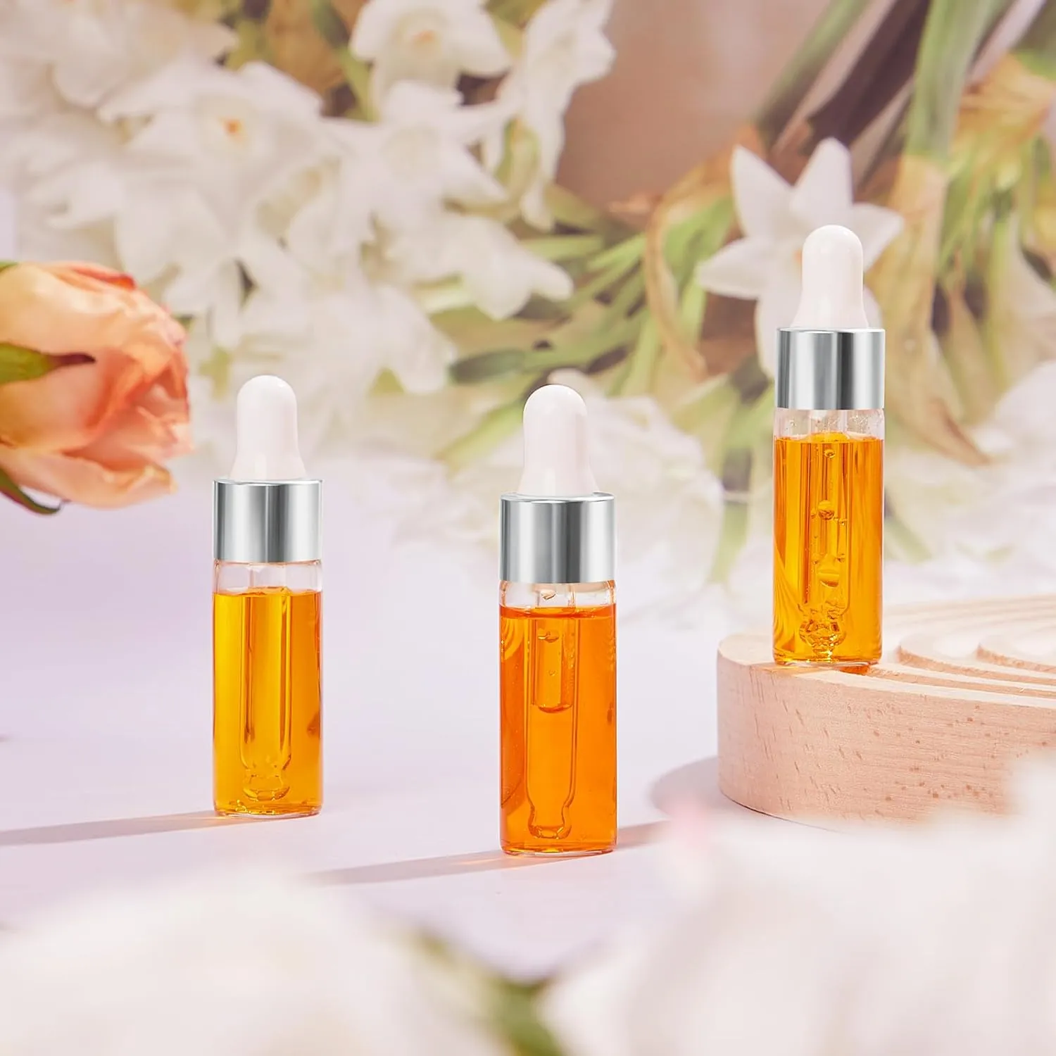 100 Pcs Mini Glass Oil Dropper Bottle Bulk, 5 ml Sliver Clear Essential Small Empty Bottles Sample Containers Perfume Liquid Vials with Cap for Traveling